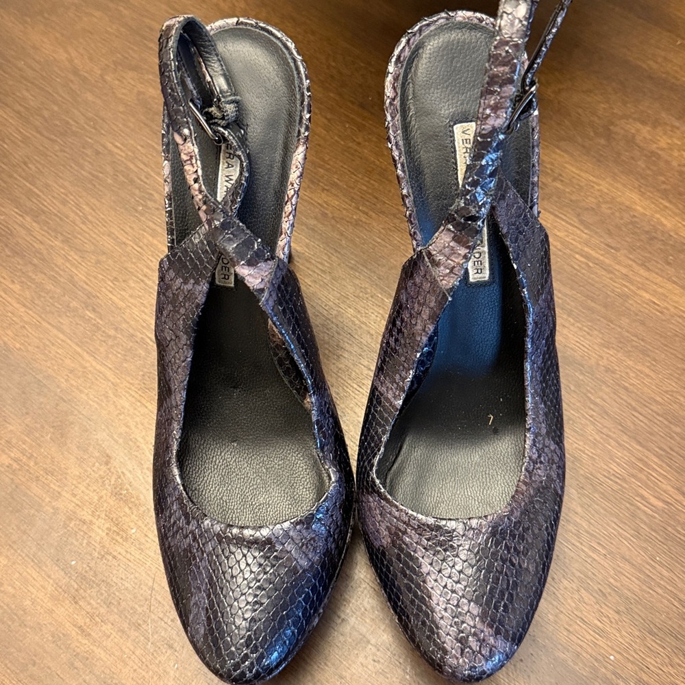 Vera Wang Lavender Snakeskin Platform Heels
5” slightly over heel - Picture 2 of 6